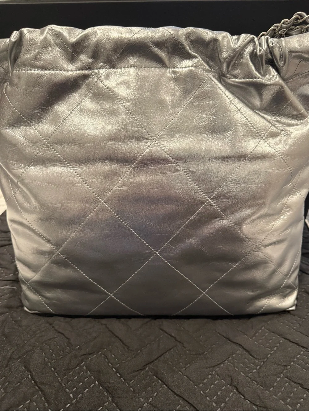 Chanel 22 in Metallic silver leather with silver hardware
